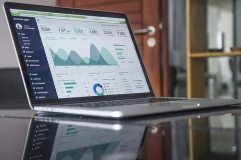 Laptop showing a marketing analytics dashboard
